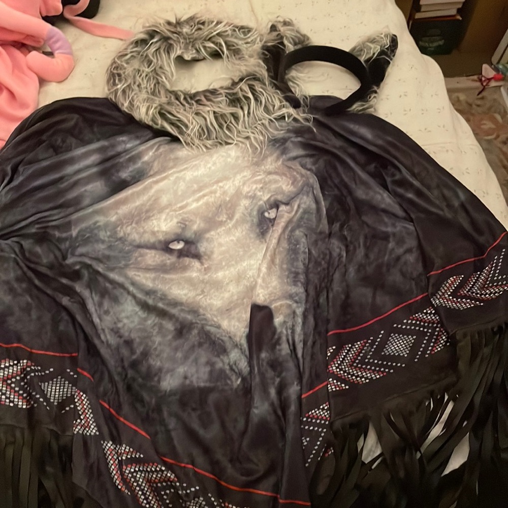 Lone wolf Halloween costume with fur collar and wolf ears